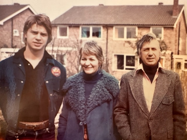 Andrew (left man in photo), Margaret (center woman in photo), and Papa (man to the right in photo)